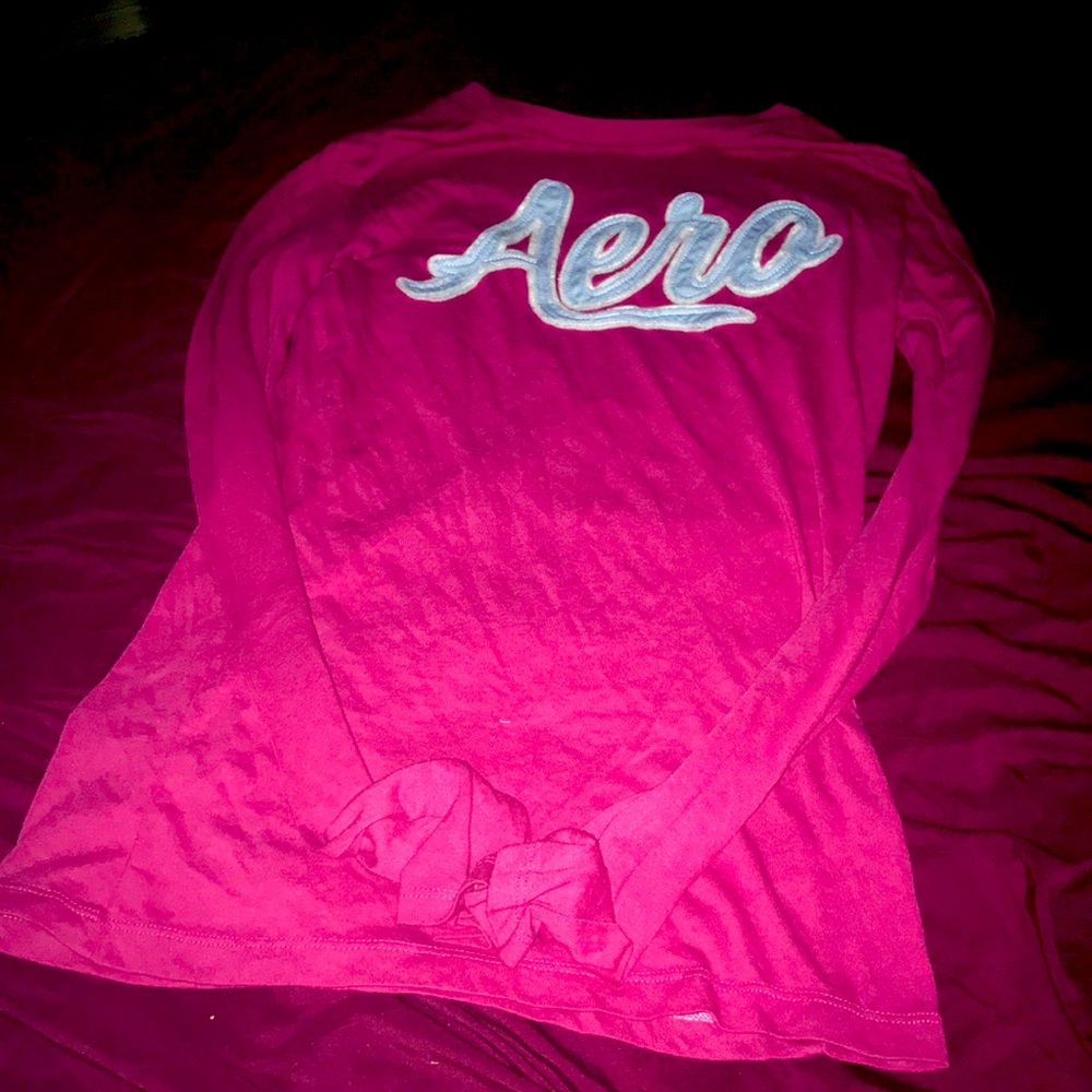 This shirt is a long sleeve pink shirt please shop